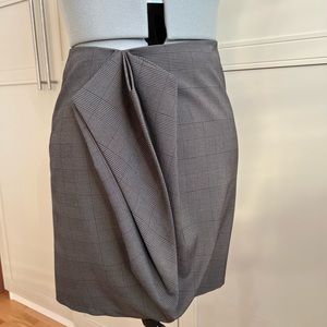 Fabulous Sisley mini-skirt with interesting pleating on the front. Size S.